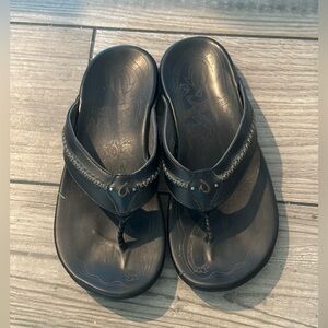 OluKai Black Flip-Flops